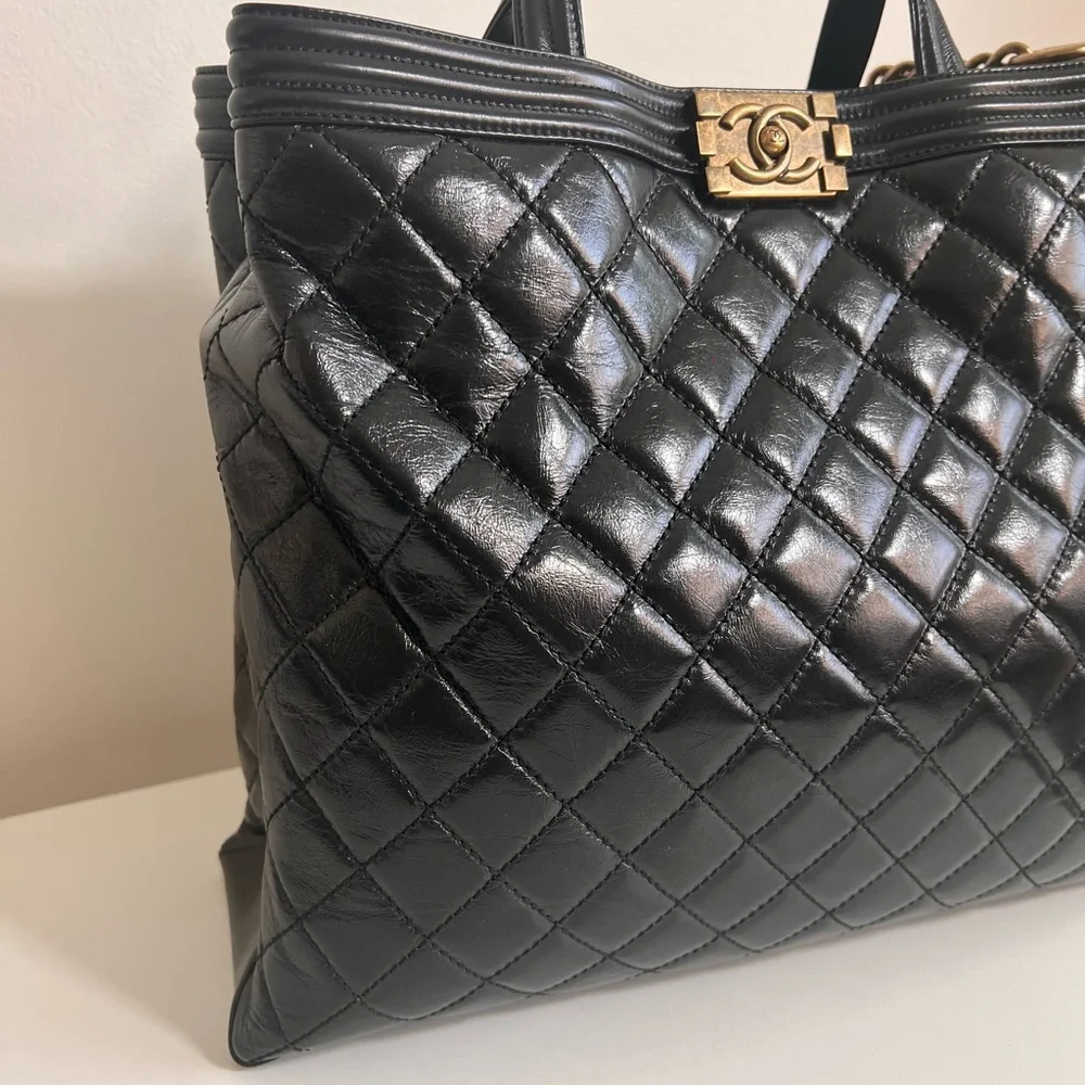 CHANEL Black Quilted Leather Laptop Tote with Gold Chain Strap